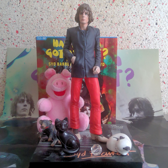 Syd Barrett statue with cats and rats and a fluffy pig